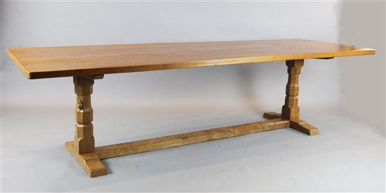 Robert Mouseman Thompson. A golden oak refectory table, W.9ft 11in. D.2ft 11in. H.2ft 5in.